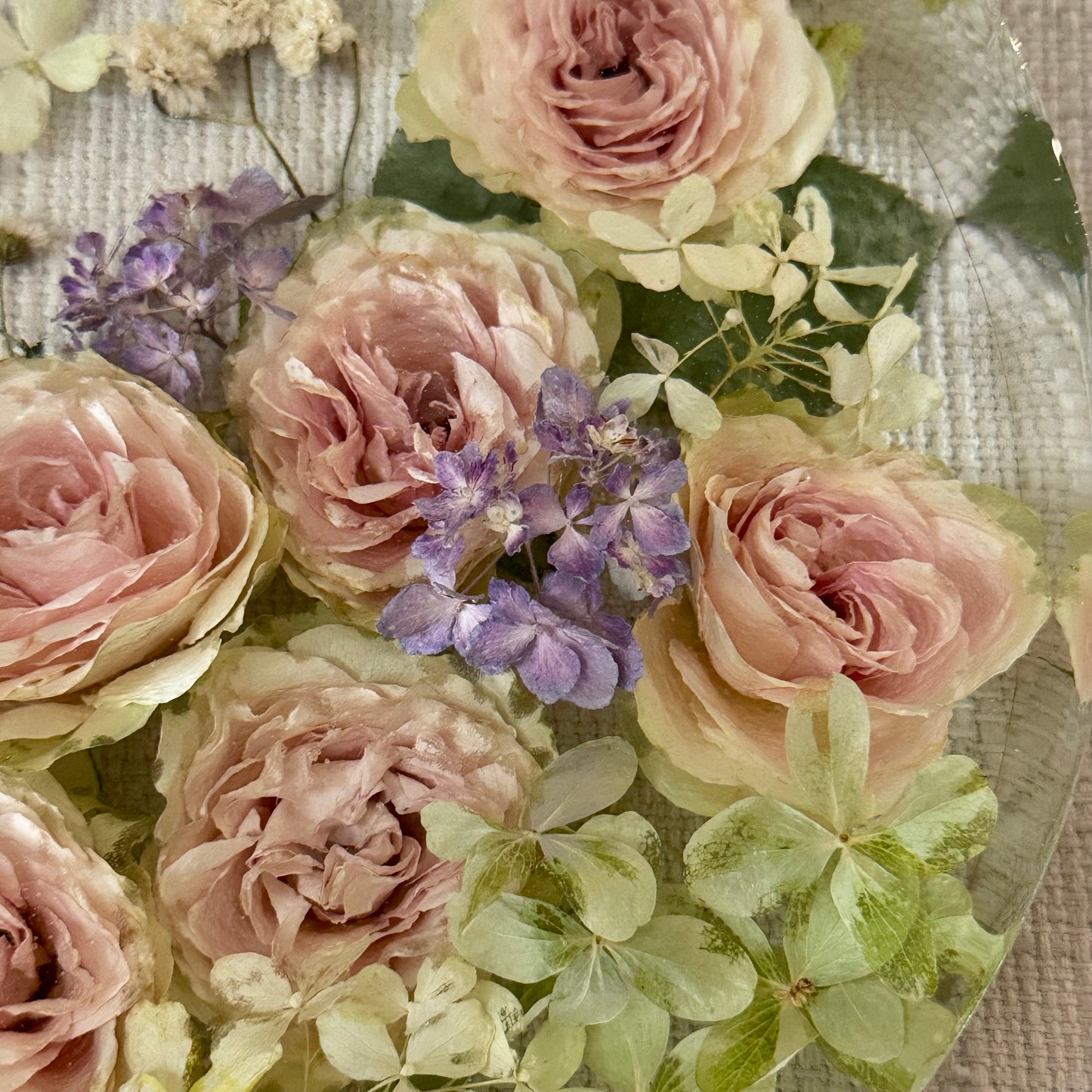 Wedding bouquet preservation of roses and hydrangeas in a resin block